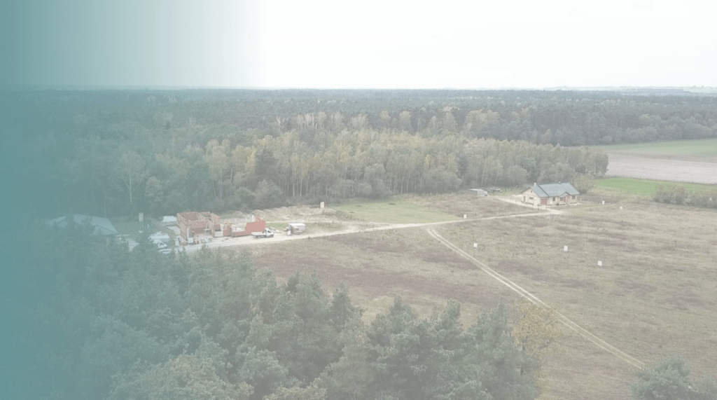 Zdjęcie przedstawia działki budowlane w hero zakupu działki budowlanej z opiekunem homependium